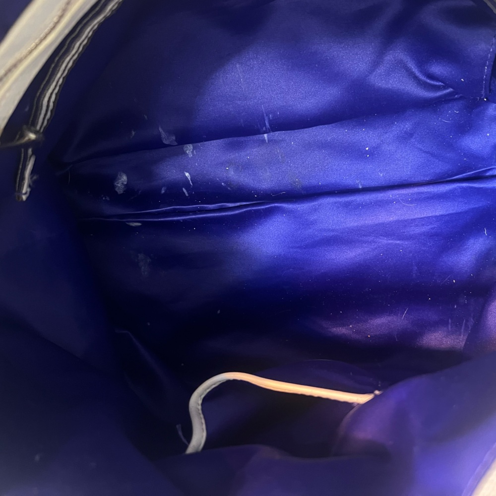 Henri Bendel Jetsetter convertible backpack with purple interior lining. - Picture 10 of 15